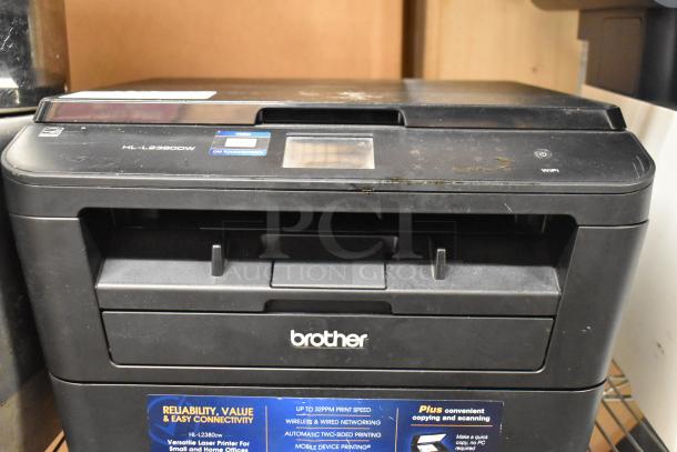 Brother HL-L2380DW multifunction printer, copier, and fax machine. Features Wi-Fi, touchscreen, slight surface wear, visible label.