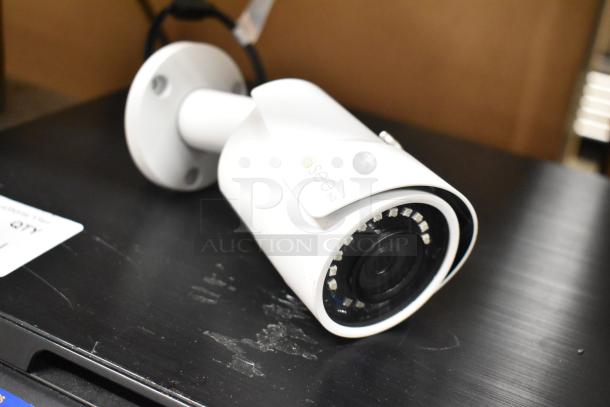 Qsee QCA8075B security camera, white, with visible infrared LEDs, good condition, brand logo on the side.