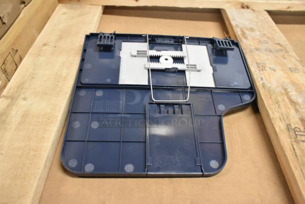 Plastic component from a Xerox WorkCentre 3345 printer copier machine, showing blue color and intricate gear mechanism.