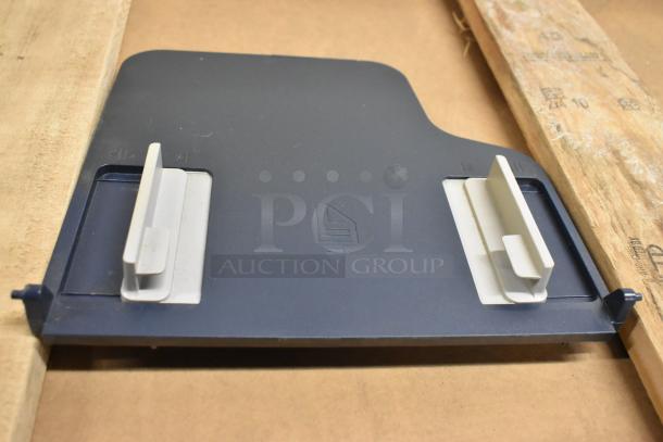 Xerox WorkCentre 3345 paper tray, dark blue with white slide guides, in good condition, viewed from above.