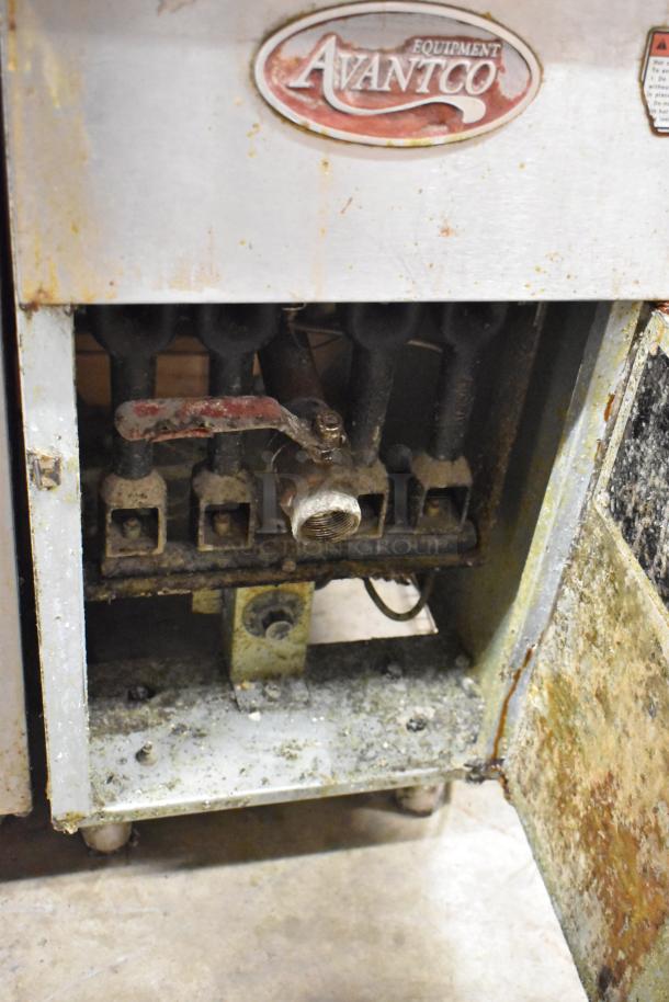 Avantco EF400-P propane gas fryer, stainless steel, with 2 metal baskets, 120,000 BTU, visible rust and wear, Avantco label.