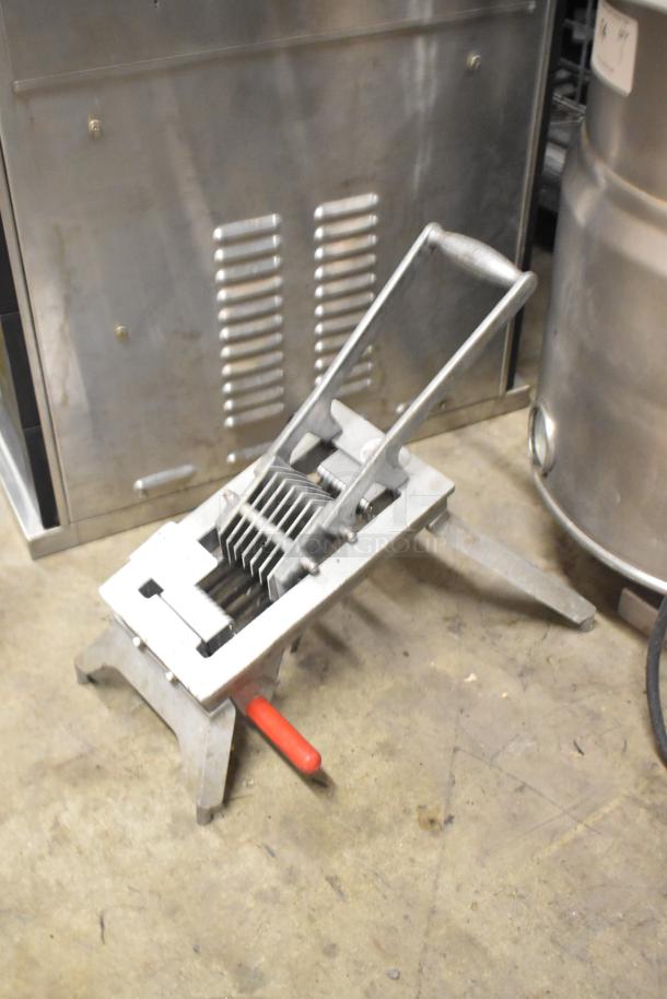 Vollrath Metal Countertop Onion King Slicer, used condition, featuring sturdy metal blades and a red handle lever.