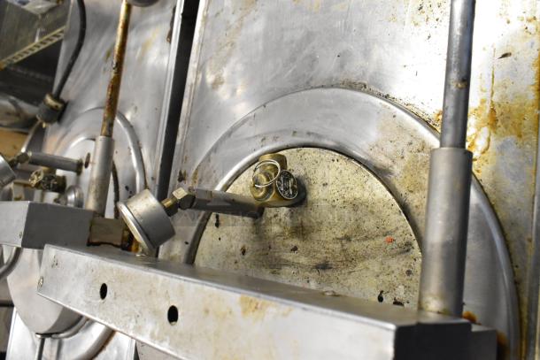 Broaster 1800GH stainless steel pressure fryer, commercial floor model, natural gas powered, 65,000 BTU, used condition.