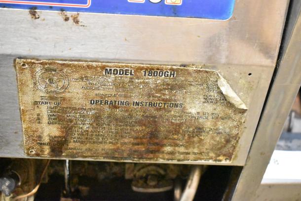 Broaster 1800GH Pressure Fryer, stainless steel, natural gas, 65,000 BTU, visible operating instructions, fair condition.