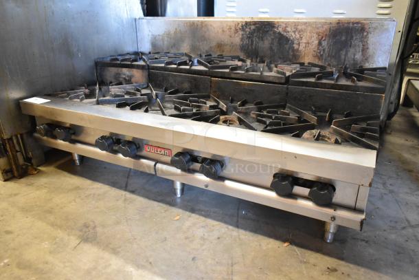 Vulcan stainless steel commercial countertop gas range, 2-tier, 8 burners, used condition, visible logo, sturdy build.