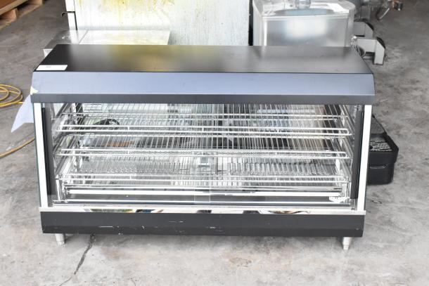 Brand new Vollrath 922HFM48 hot food merchandiser with minor scratches. Metal, countertop model, 120V, 1 phase.