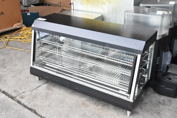 Brand new Vollrath 922HFM48 metal countertop hot food merchandiser with minor scratches, 120V, 1 phase, glass front.