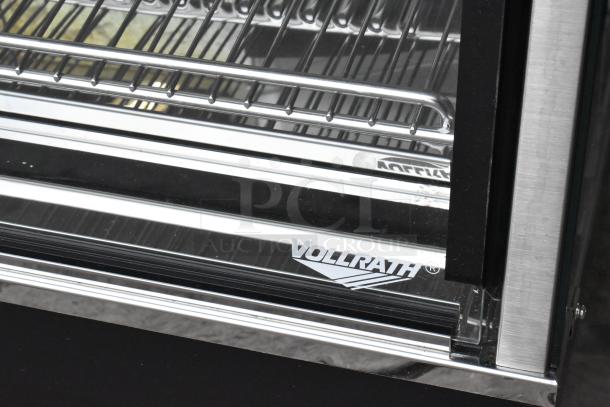 Brand new Vollrath 922HFM48 metal commercial hot food merchandiser, 120V, 1 phase, with minor scratches and dents.