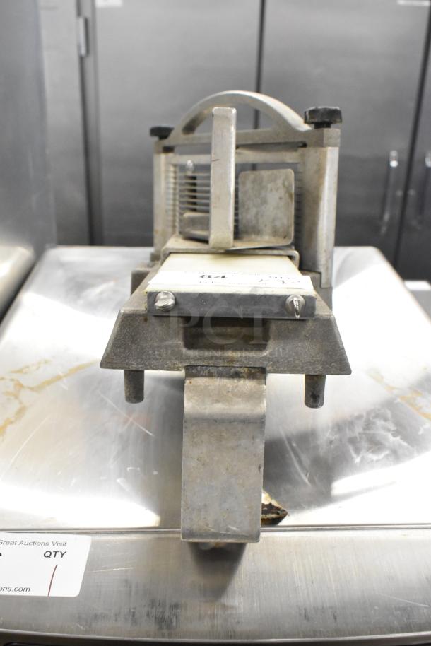 Nemco Tomato Slicer, metal construction, visible wear. Includes two items in this auction lot.
