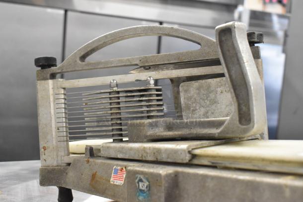 Nemco Tomato Slicer with multiple sharp blades, sturdy metal frame, and "Made in USA" and "NSF" stickers visible.