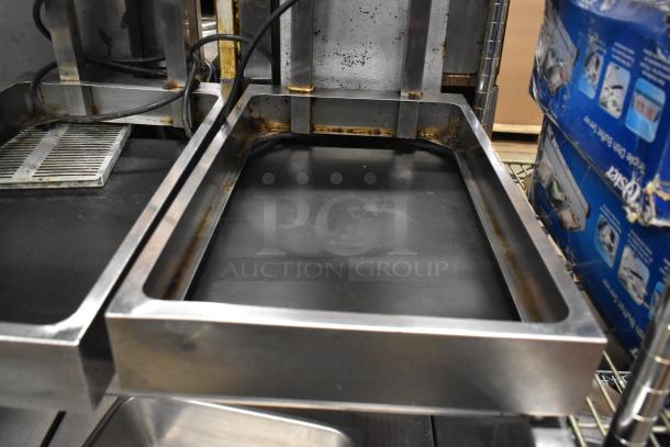 2 Avantco metal commercial countertop food warmers, 120 volts, in used condition, with visible rust and wear.