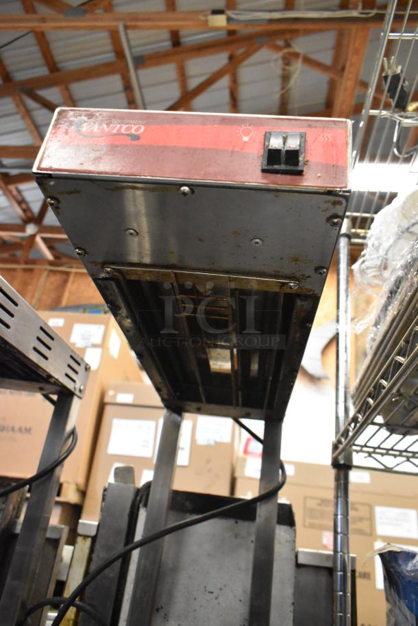 Avantco metal commercial countertop food warmer, 120 volts, visible wear, features control switches, suitable for commercial use.