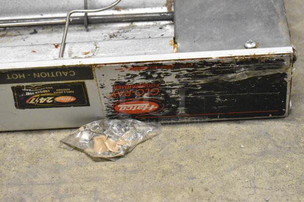 Hatco GRAHL-30D metal heat strip, 120/208 volts, 1 phase, worn condition, visible caution labels, Hatco branding.