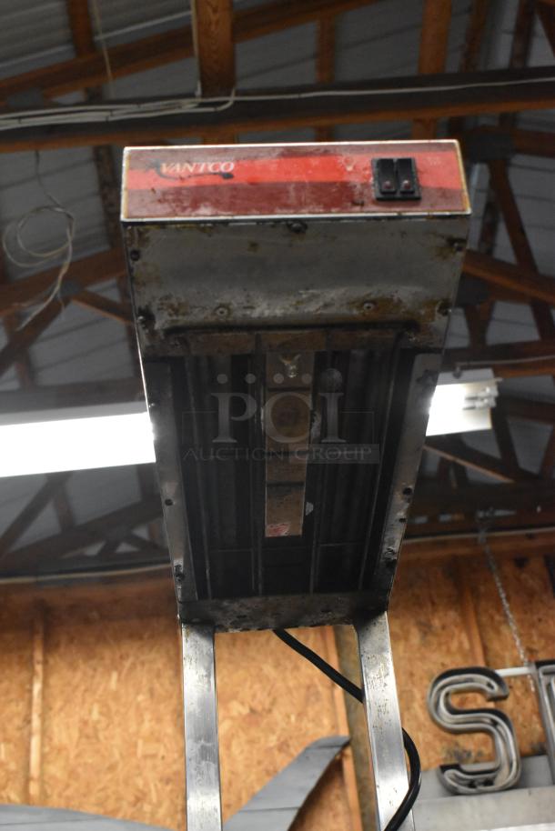 Avantco metal countertop warmer, 120 volts, single phase, visible wear, scratches on metal surface, Avantco label on top.