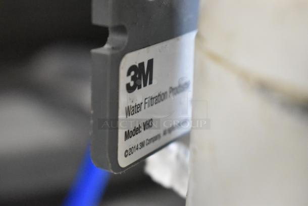 2 3M VH3 water filter cartridges, featuring visible label. Good condition, valuable for efficient filtration.