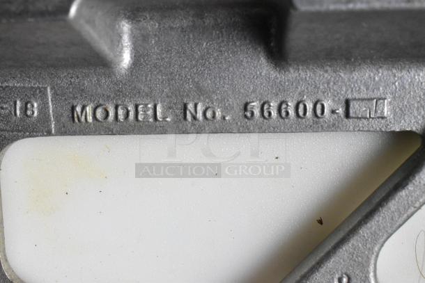 Nemco 56600 Metal Countertop Tomato Slicer, model number embossed on metal surface. Ideal for precise slicing.