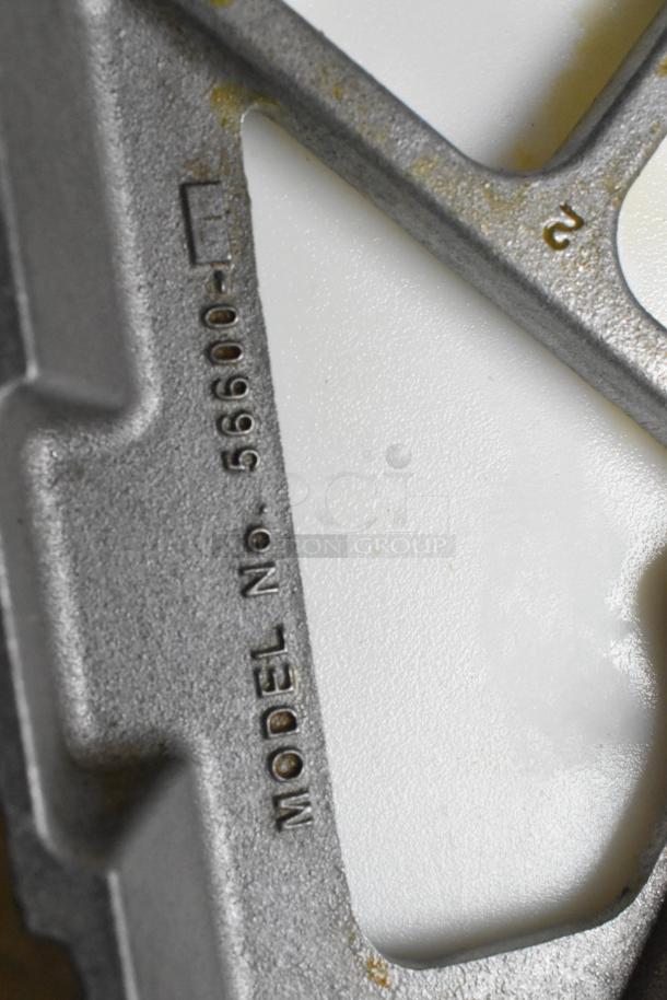 Nemco 56600 Metal Countertop Tomato Slicer, showing model number marking on a metal surface, indicating authenticity.