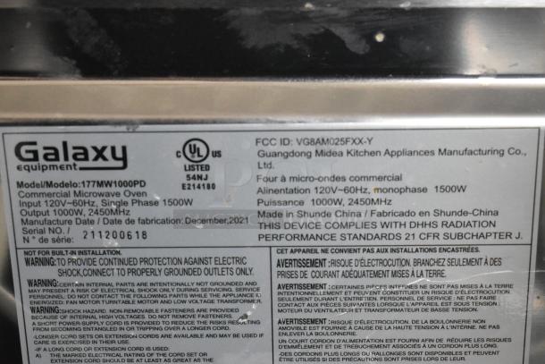 2021 Galaxy 177MW1000PD commercial microwave oven, 120V, 1000W output, 1 phase. Features safety and compliance labels.