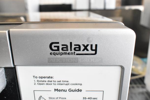 2021 Galaxy 177MW1000PD commercial countertop microwave oven, metal finish, 120V, model label and operation guide visible.
