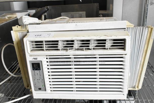 Arctic King window air conditioner, 115 volts, 1 phase, used condition, visible controls and label, minor wear.