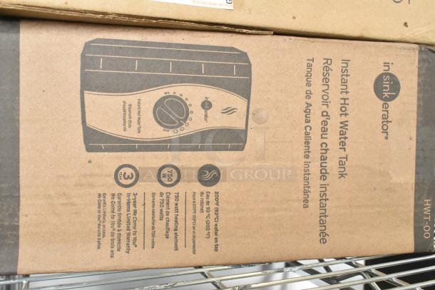 3M Subway Water Filter Cartridge Kit and two Insinkerator Instant Hot Water Tanks in original boxes. Box shows product details.