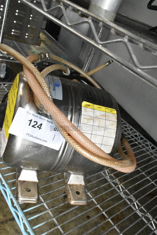 Shurflo Water Booster, 115V, 1 Phase. Metal finish, visible hoses, mounting brackets. Moderate wear, label indicates specs.