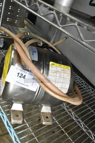 Shurflo Water Booster, 115V, 1 Phase. Metal finish, visible hoses, mounting brackets. Moderate wear, label indicates specs.