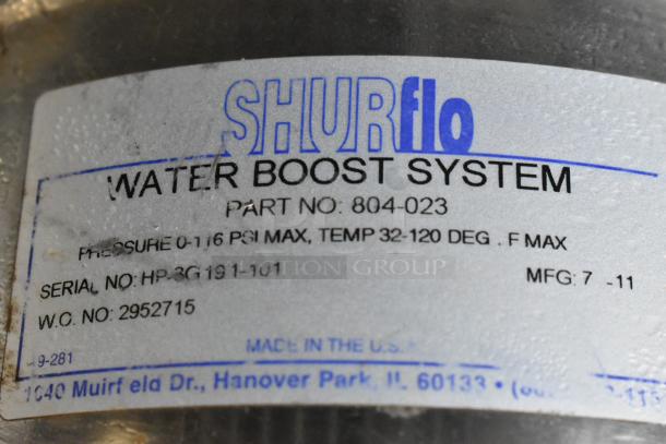 Shurflo Water Booster label, 115 volts, 1 phase. Part 804-023, pressure 0-116 PSI, temp 32-120°F, serial HP-3G191-101.