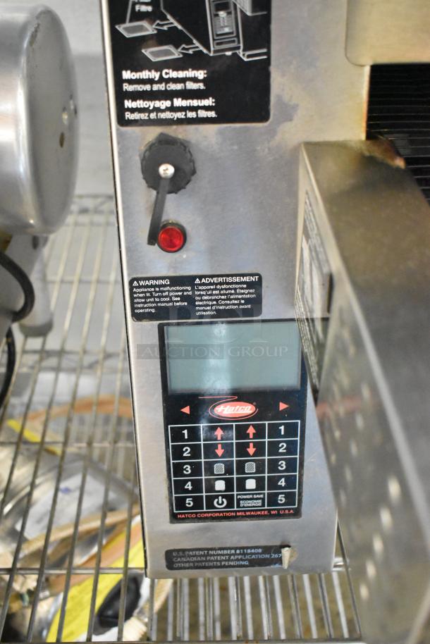 Hatco ITQ-1750-2C conveyor toaster in stainless steel, 1800 slices/hr, 208V, 1 phase. Control panel and labels visible.