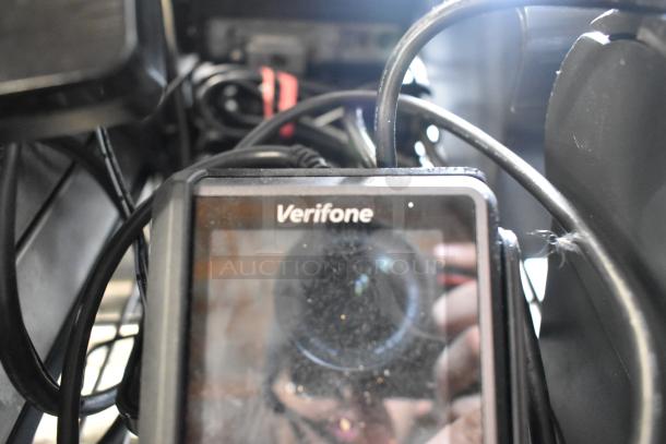 ViewSonic POS system setup with Verifone card reader, surrounded by cables. Includes 4 Epson printers, cash drawer, and keyboard.