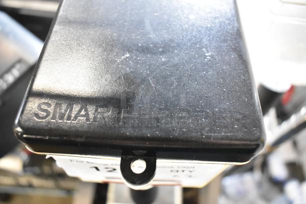 2 clear poly coffee bean grinder hoppers with "Smart Hopper" marking. Missing one lid. Suitable for replacements or spare parts.