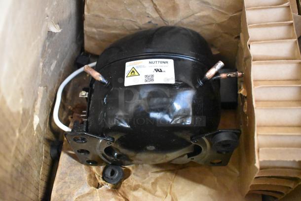 Avantco 17817638 compressor for APT, SS, and UDD series, black, shown with label in packaging, excellent condition.