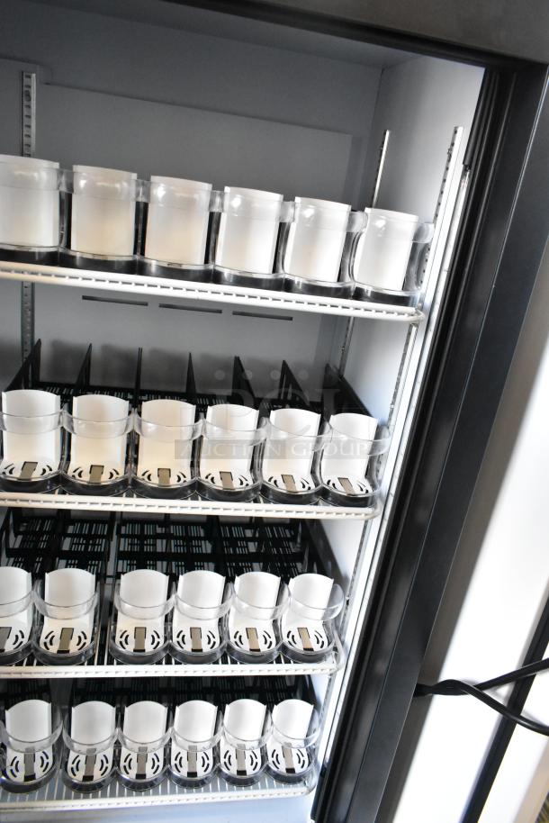 QBD CD4160-HC 2 Door Commercial Cooler with poly coated racks, 115V, showcasing interior with organized shelves.