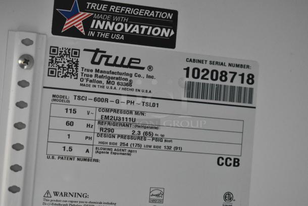 Label for True TSCI-600R-G-PH Cooler, 115V, 1 Phase. Shows compressor model EM2U3111U and refrigerant R290. Serial: 10208718.