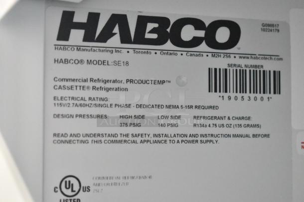 Label of Habco SE18 Commercial Refrigerator, showing model, electrical rating 115V/2.7A/60Hz, refrigerant details, UL listed.