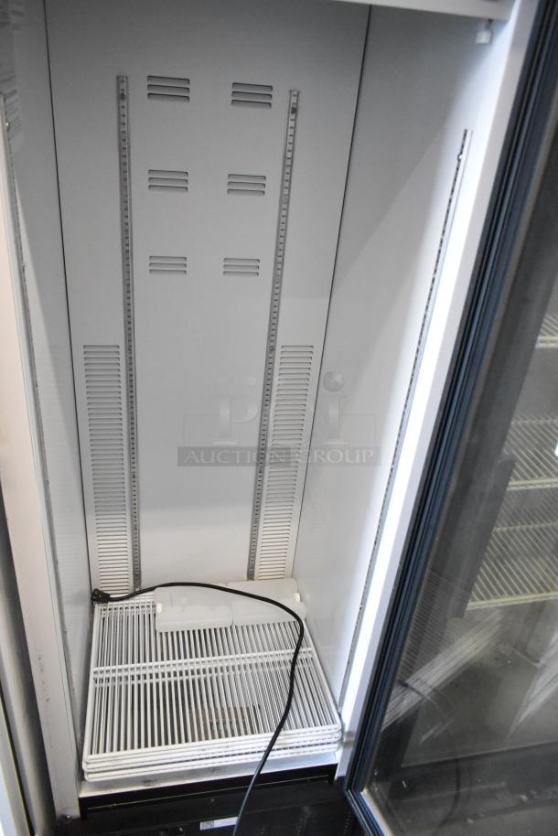 2019 Habco SE18 commercial metal single door cooler, poly-coated racks, 115V, 1 phase; interior view showing wire rack.