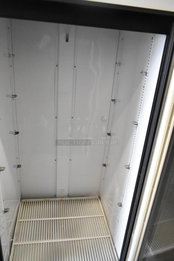 True GDM-26 commercial cooler, single glass door, poly-coated racks, 115V, 1 phase, excellent condition.