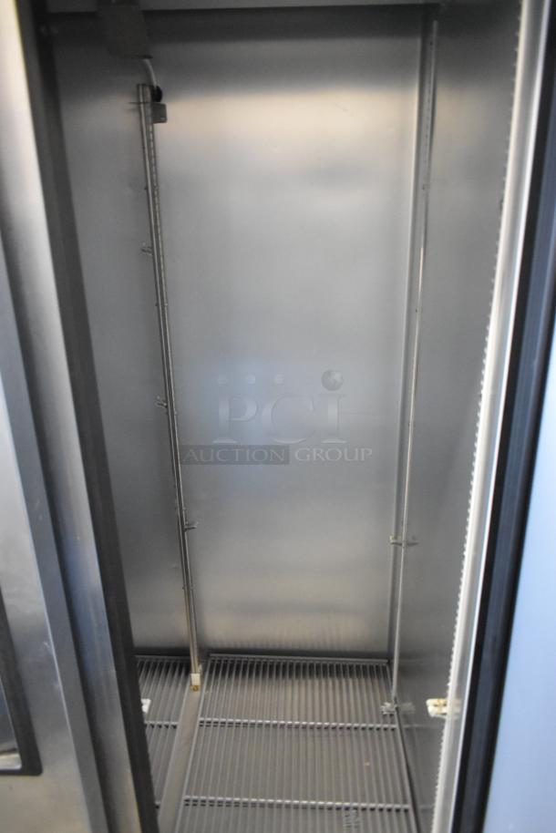 2022 True T-35-HC stainless steel commercial cooler interior, two-door, poly-coated racks, 115V, excellent condition.