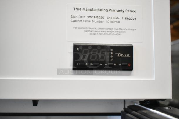 2021 True TSCI-600R-G-PH commercial cooler, features digital display, warranty info, and serial number 10100590. 115V, 1 phase.