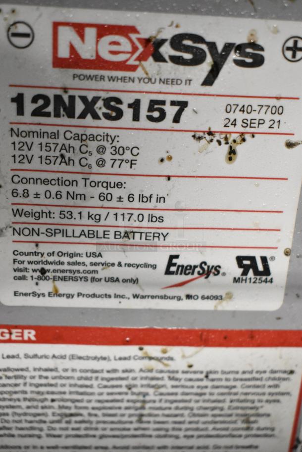 NexSys 12NXS157 TPPL battery label showing specs: 12V 157Ah, weight 53.1kg. Made by EnerSys in the USA, dated 24 Sep 21.