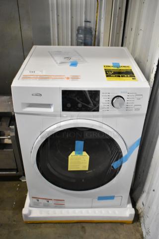 Brand new KoolMore FLW-3CWH 2.7 cu. ft. stackable front load washing machine, visible labels, minor scratches, 120V.