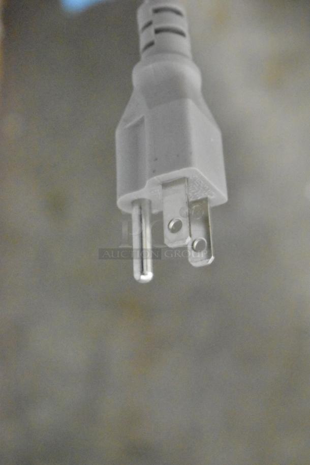 White power plug for KoolMore FLW-3CWH washing machine, 120 volts, 1 phase, detailed close-up.