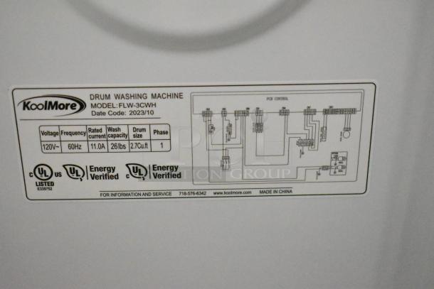 Brand new KoolMore FLW-3CWH 2.7 cu. ft. compact washer label showing specs: 120V, 60Hz, 11A, UL listed.