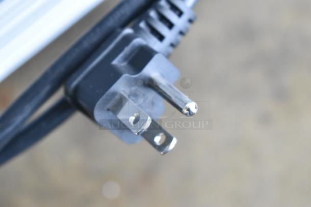 Close-up of power plug for KoolMore KM-MDR-1GD-10C refrigerator. 115 volts, 1 phase. Brand new with scratch and dent condition.