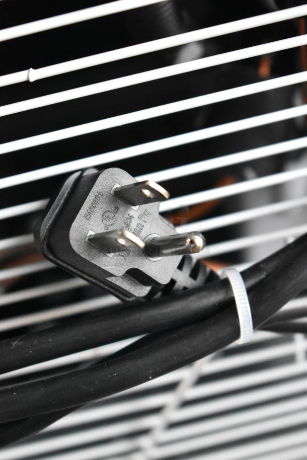 Power cord of KoolMore KM-MDR-1GD-10C refrigerator; 115V, 1 phase. UL-listed plug with visible certification markings.