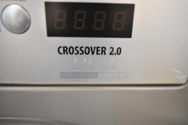 BRAND NEW SCRATCH AND DENT Crossover 2.0 metal front load washer with digital display.