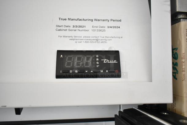 2021 True TSCI-600R-G-PH cooler display panel with warranty info, serial number 10133625, poly coated racks included.