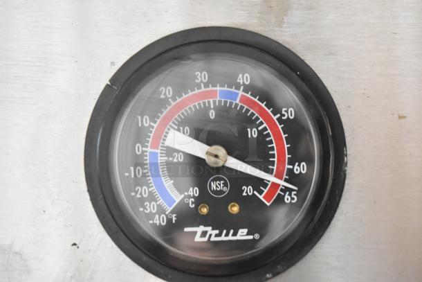 Thermometer on 2016 True T-35-HC Reach In Cooler, showing temperature in Fahrenheit and Celsius. NSF certified.