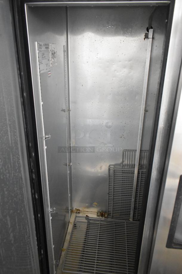 2016 True T-35-HC stainless steel 2-door cooler, poly-coated racks, visible label with model info, 115V, 1 phase, commercial use.