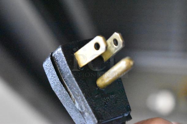 Close-up of the plug for a 2016 True T-35-HC Stainless Steel Commercial Cooler, 115 Volts, 1 Phase.